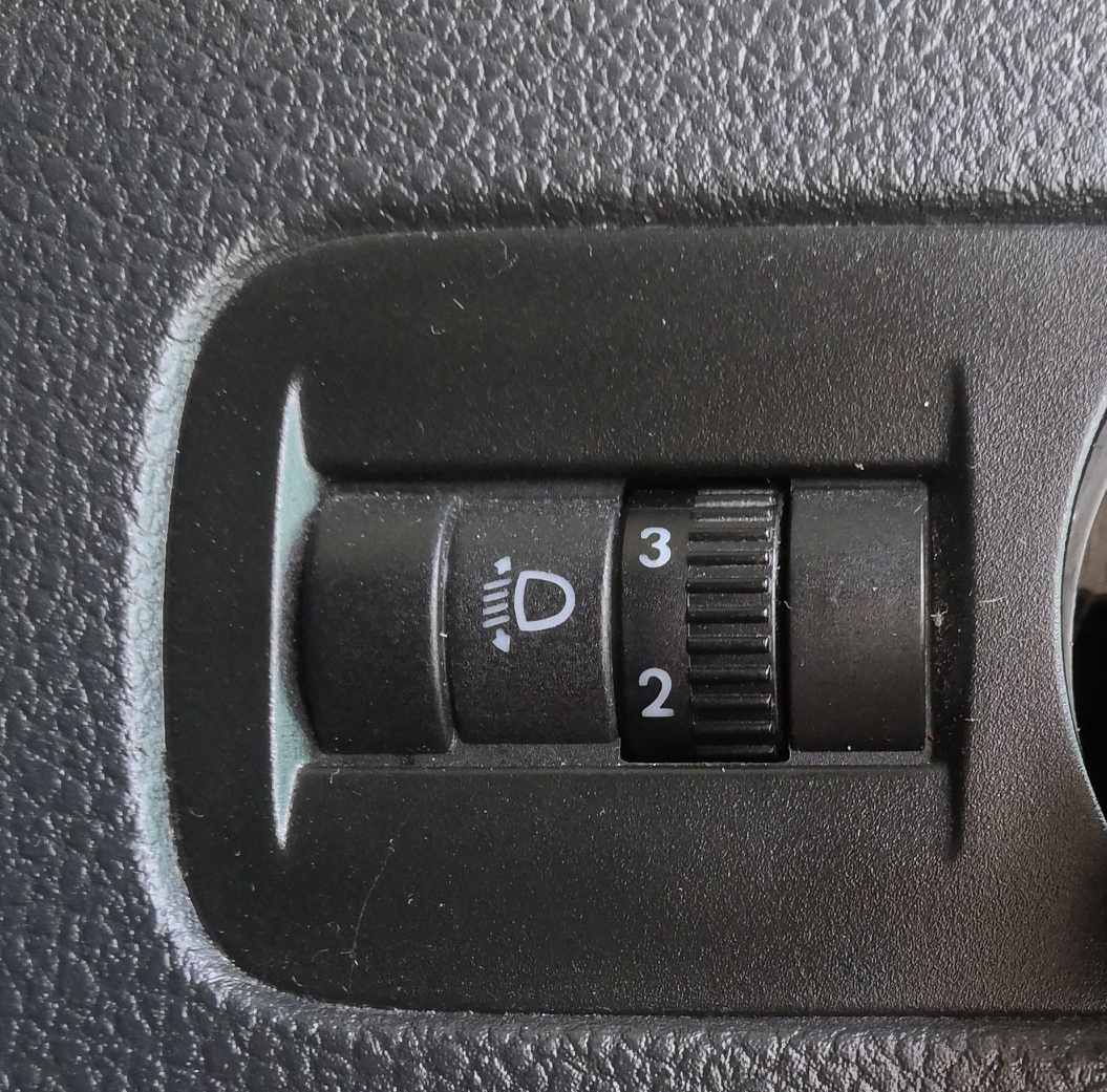 my car has only headlight level adjuster.